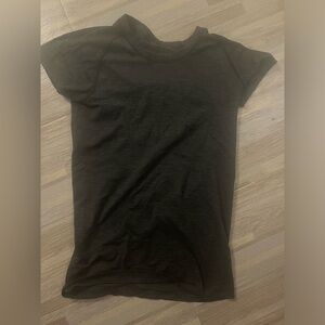 Dark Gray lulu swiftly, tags got ripped out but size 4! barely worn